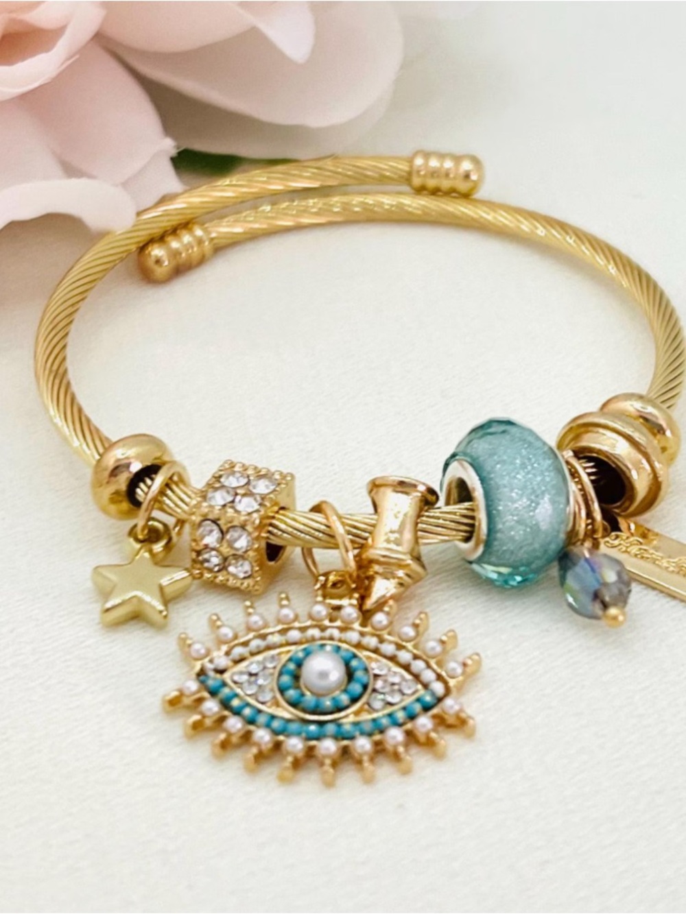 Gold-Tone Evil Eye Charm Bracelet with Turquoise Accents 8 bracelets